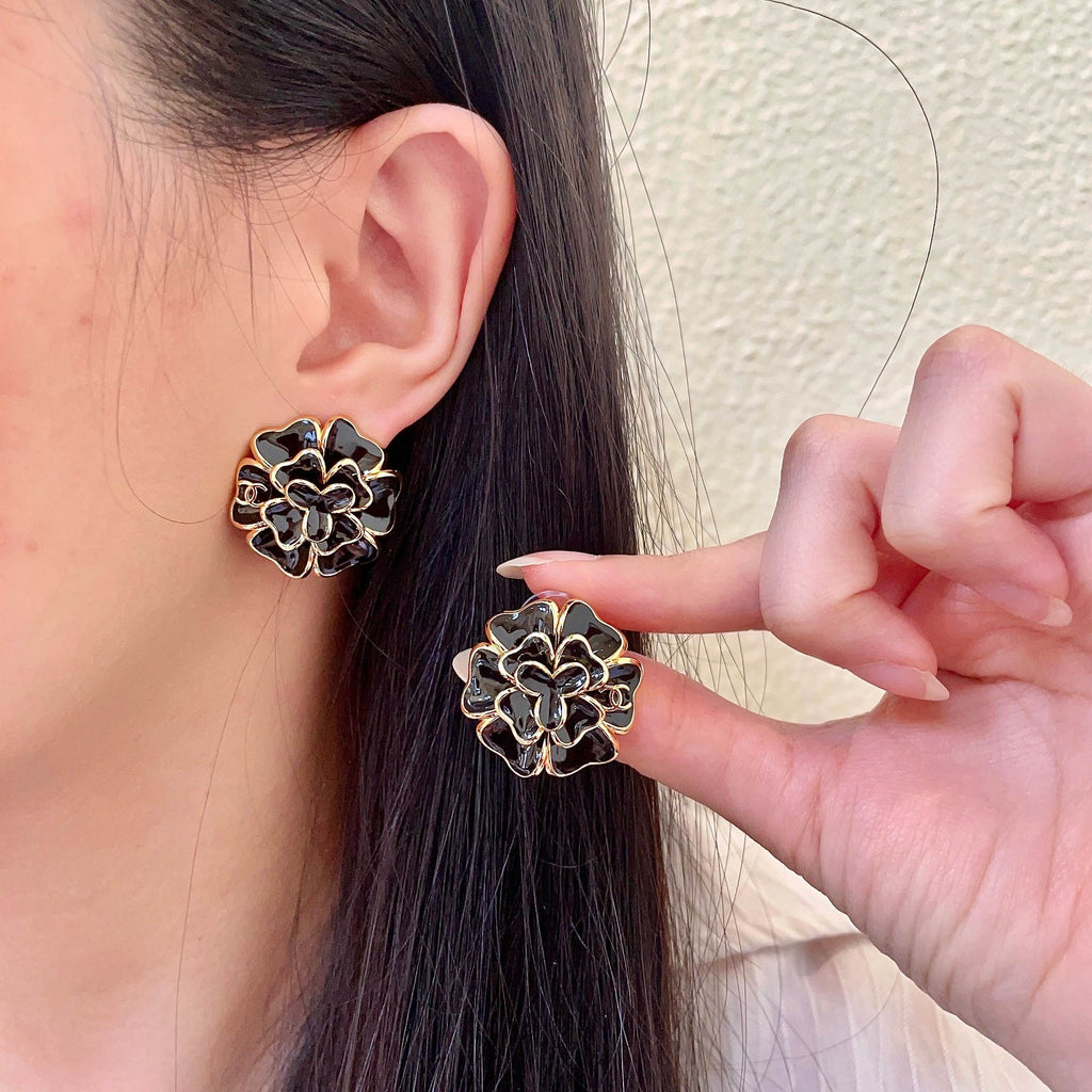 Chanel Interlocking C Camellia Stud Earrings - album image 1