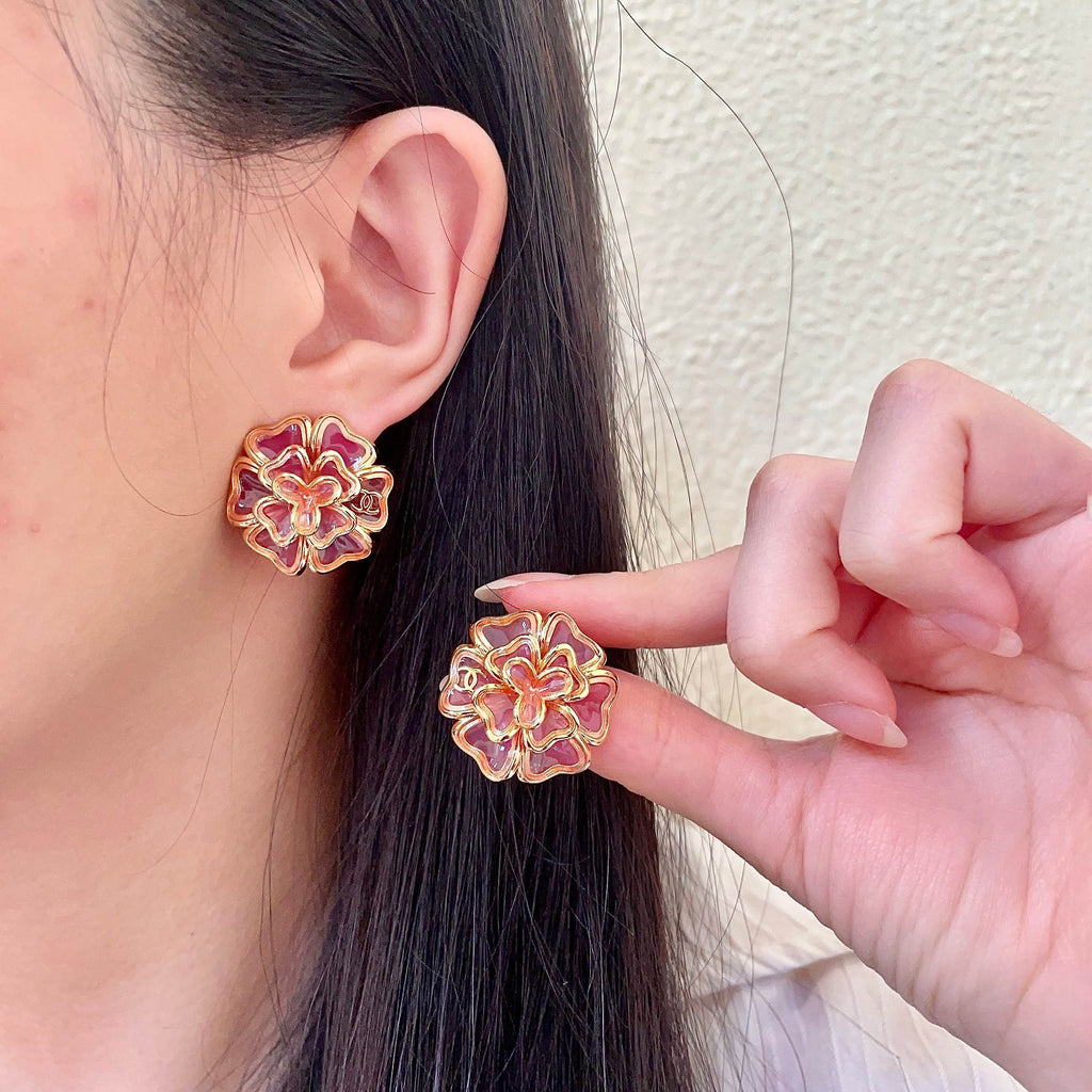 Chanel Interlocking C Camellia Stud Earrings - album image 1