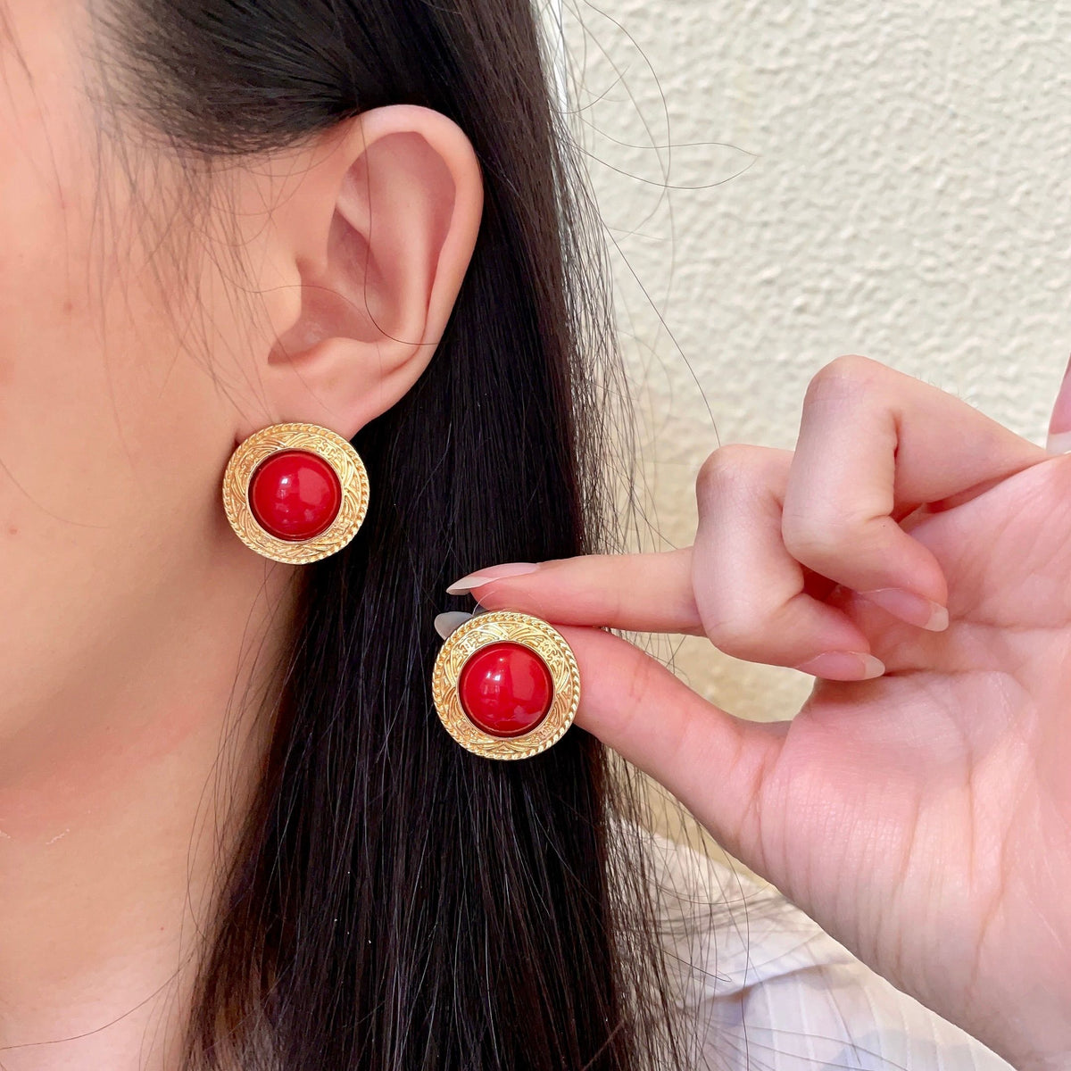 Chanel Interlocking C Stud Earrings - album image 1