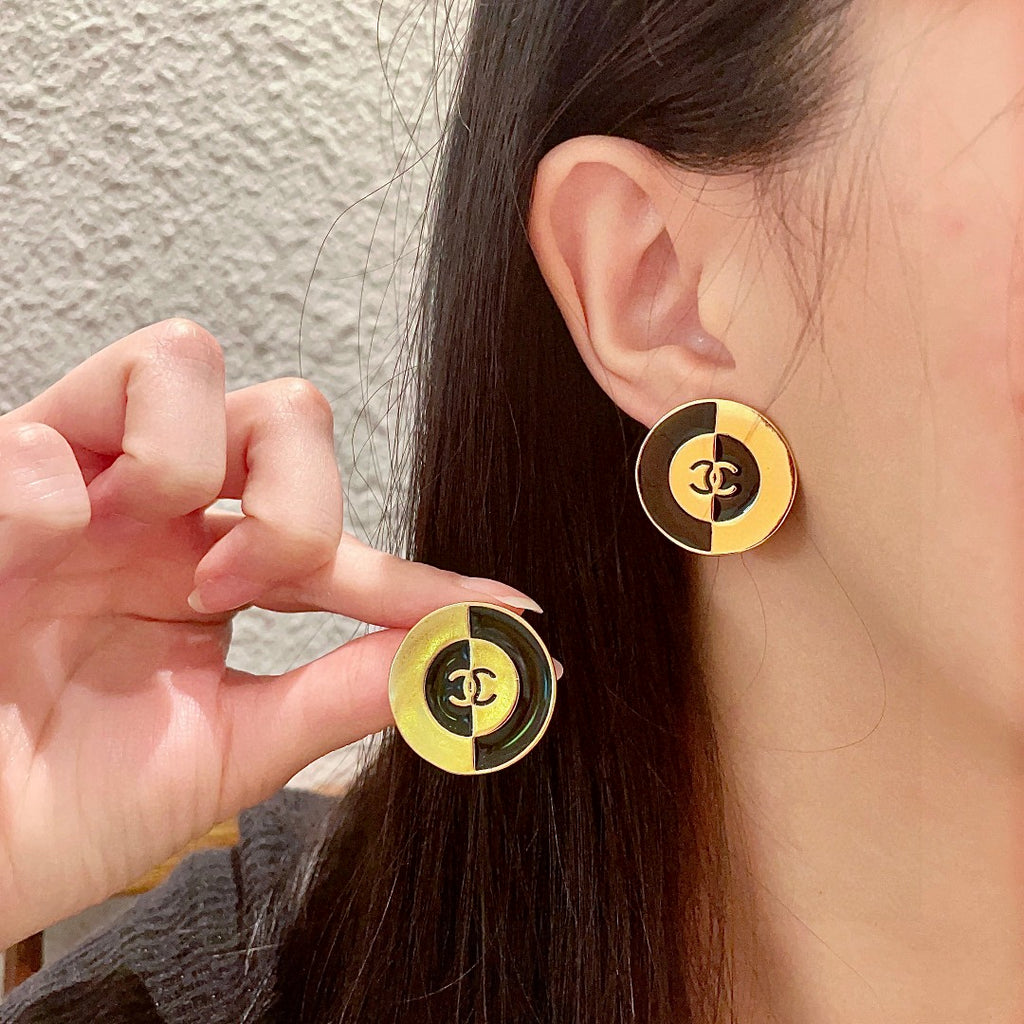 Chanel Interlocking C Stud Earrings - album image 1
