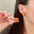 Chanel Interlocking C Heart Stud Earrings - album image 1