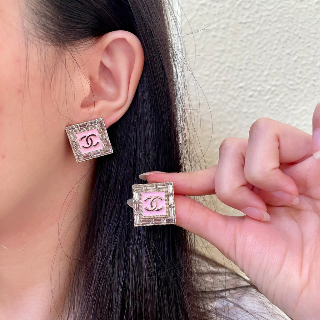 Chanel Interlocking C Stud Earrings - album image 1
