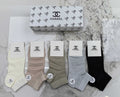 Chanel soft neutral side emblem crew socks - view 1