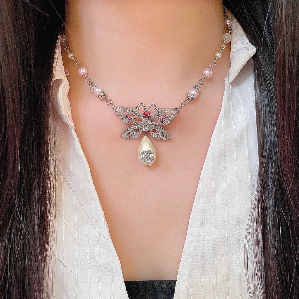 Chanel Interlocking C Bow Butterfly Pearl Crystal Accent Necklace - album image 3