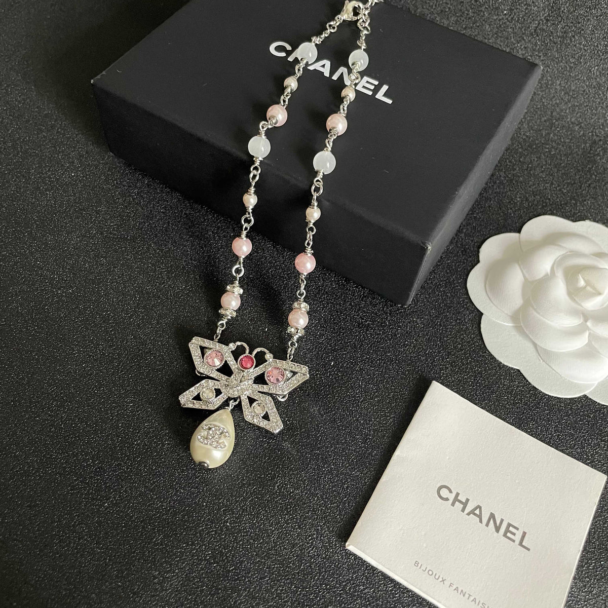 Chanel Interlocking C Bow Butterfly Pearl Crystal Accent Necklace - album image 5