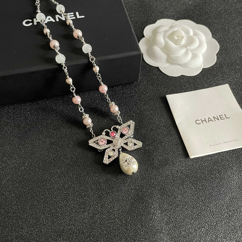 Chanel Interlocking C Bow Butterfly Pearl Crystal Accent Necklace - album image 6