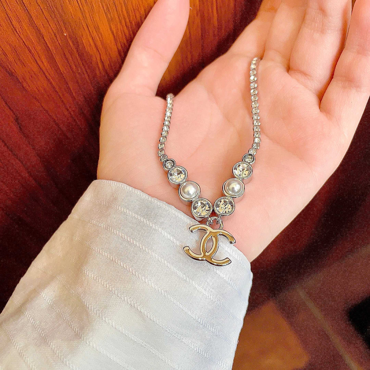 Chanel Interlocking C Pearl Necklace - album image 4