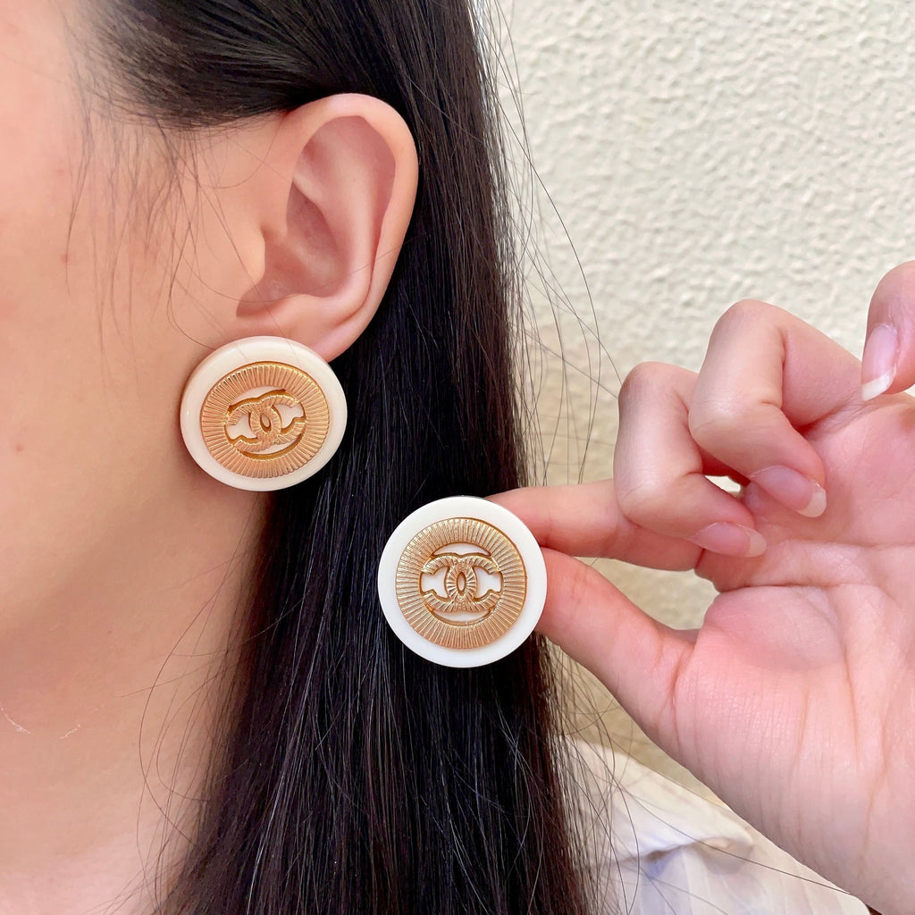 Chanel Interlocking C Stud Earrings - album image 1