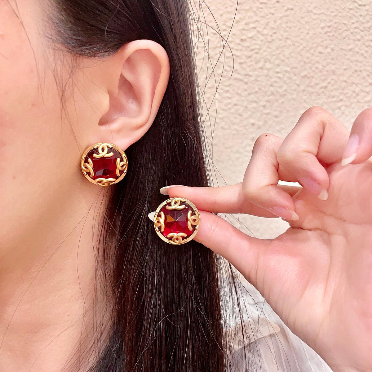 Chanel Interlocking C Stud Earrings - album image 1