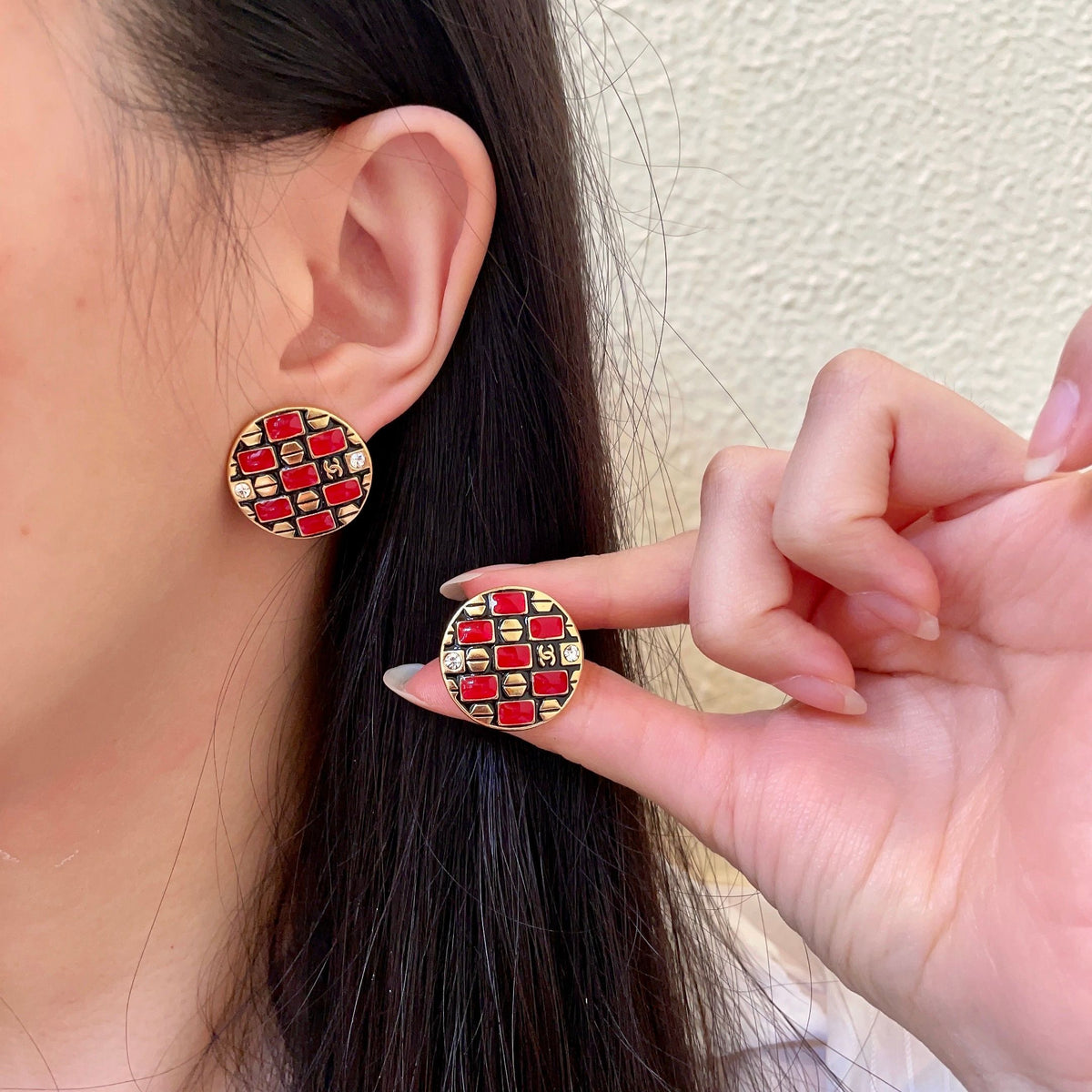 Chanel Interlocking C Stud Earrings - album image 1