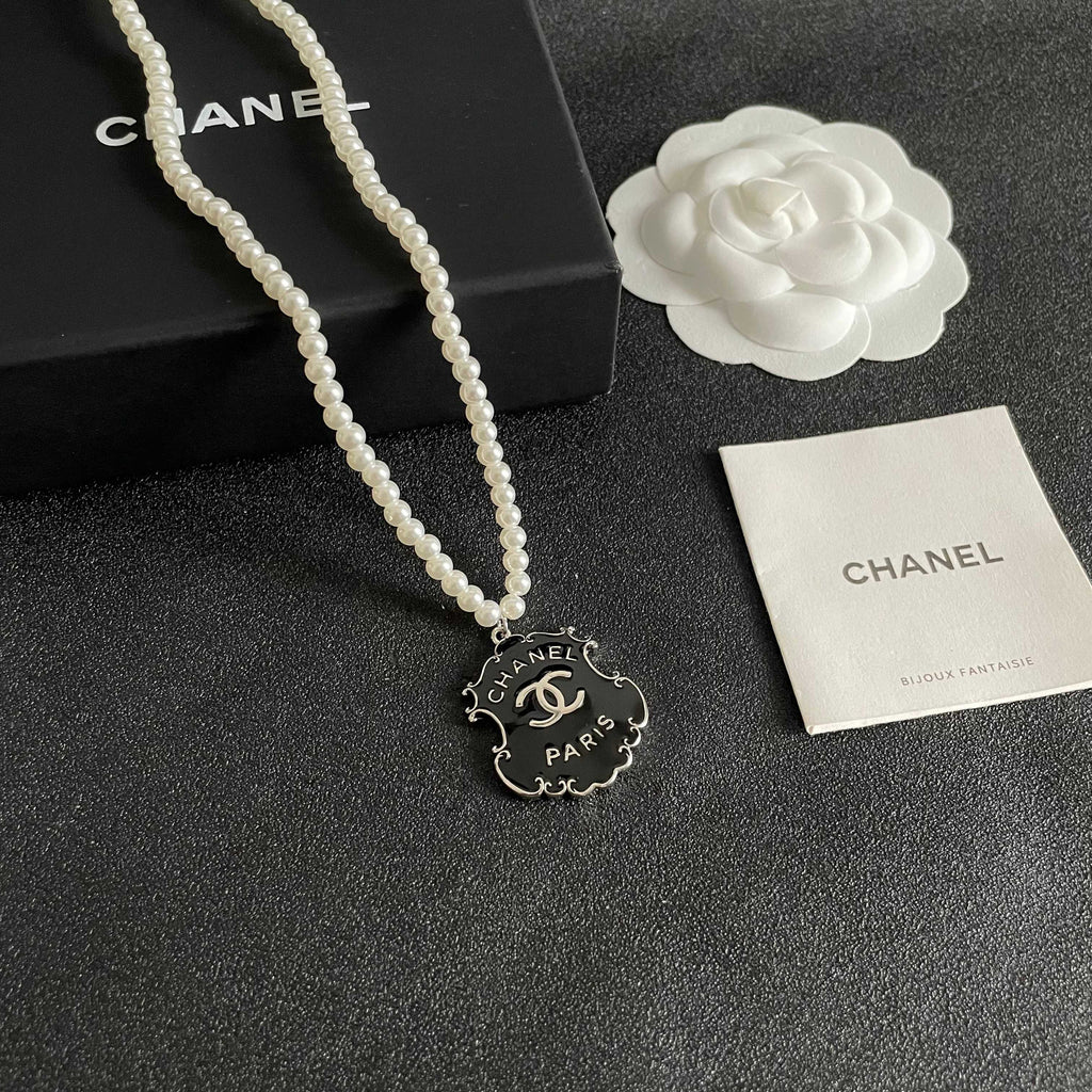 Chanel Interlocking C Pearl Letter Necklace - album image 6