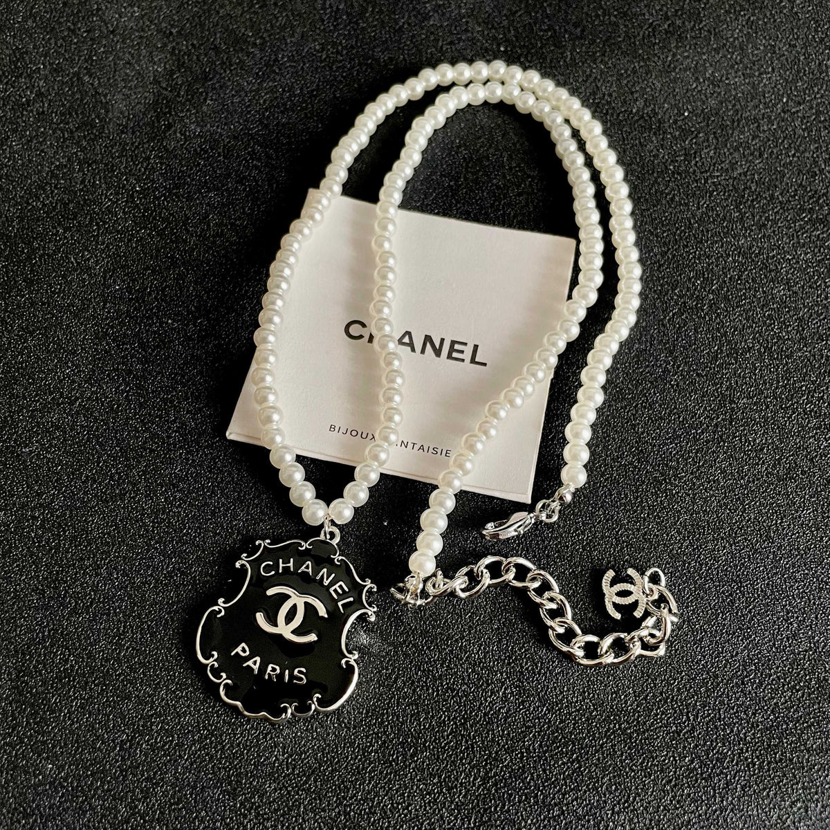 Chanel Interlocking C Pearl Letter Necklace - album image 9