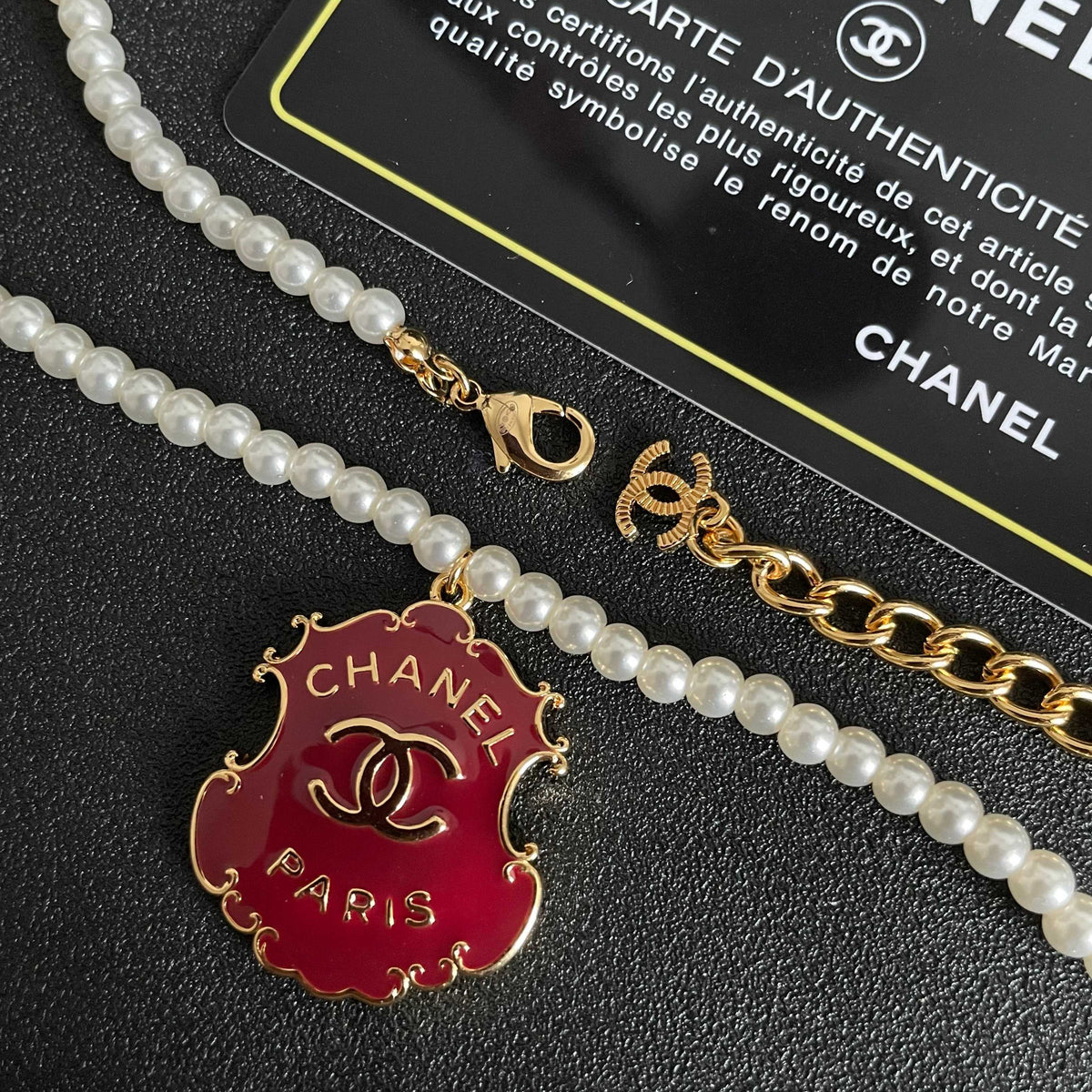 Chanel Interlocking C Pearl Letter Necklace - album image 7