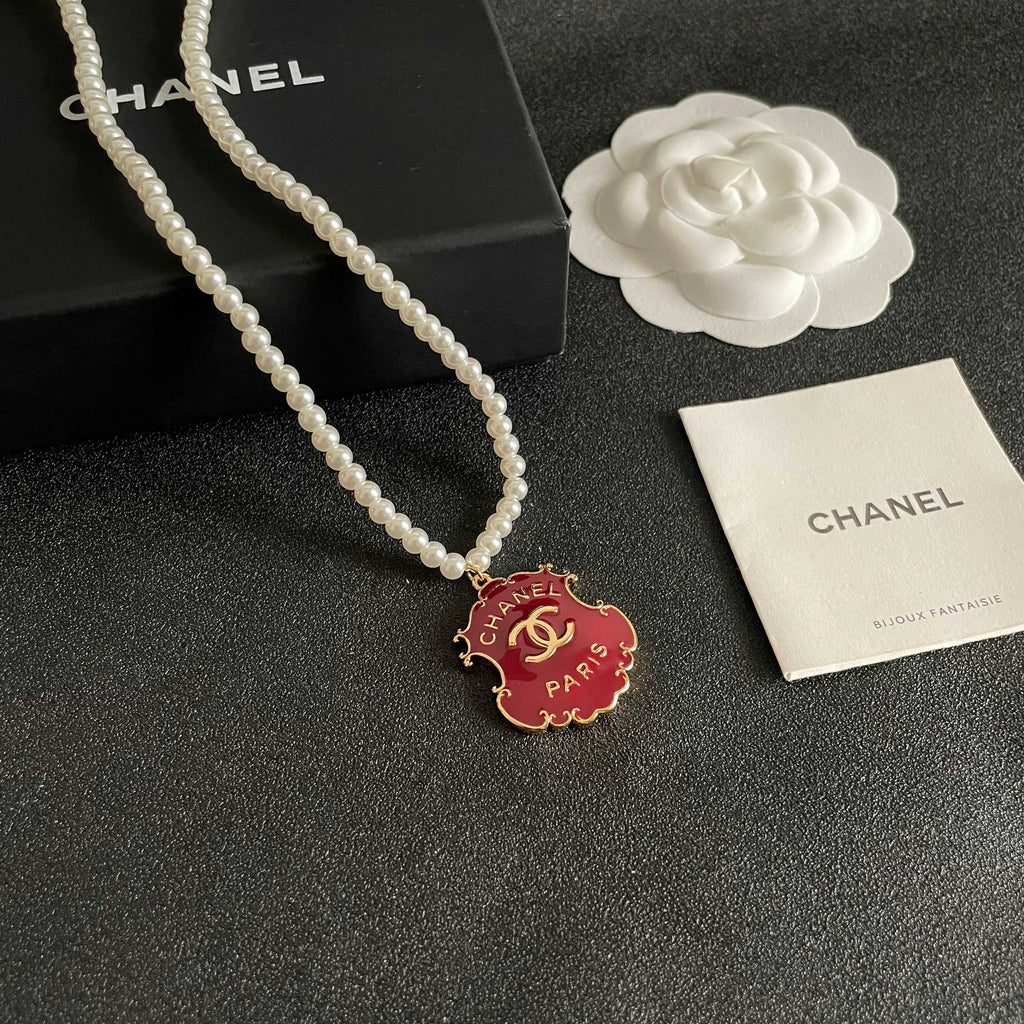Chanel Interlocking C Pearl Letter Necklace - album image 6