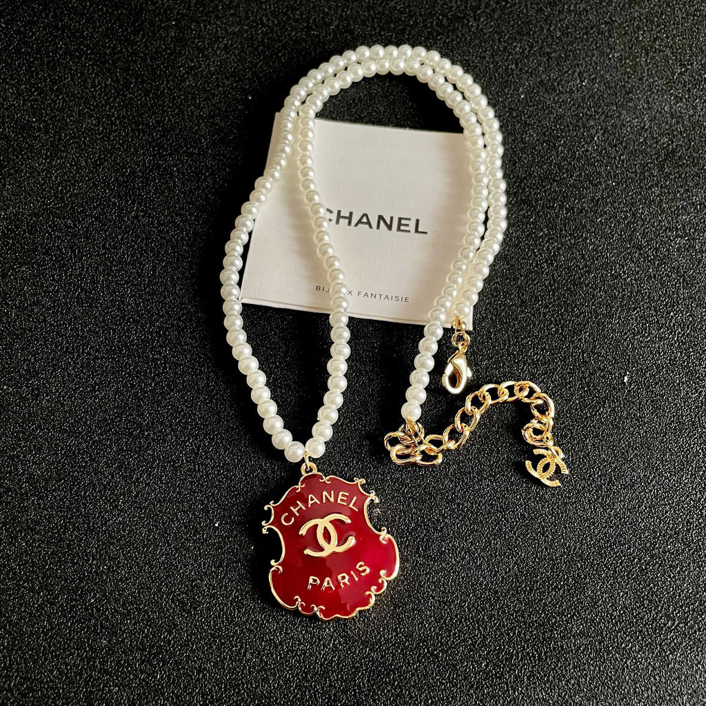 Chanel Interlocking C Pearl Letter Necklace - album image 9