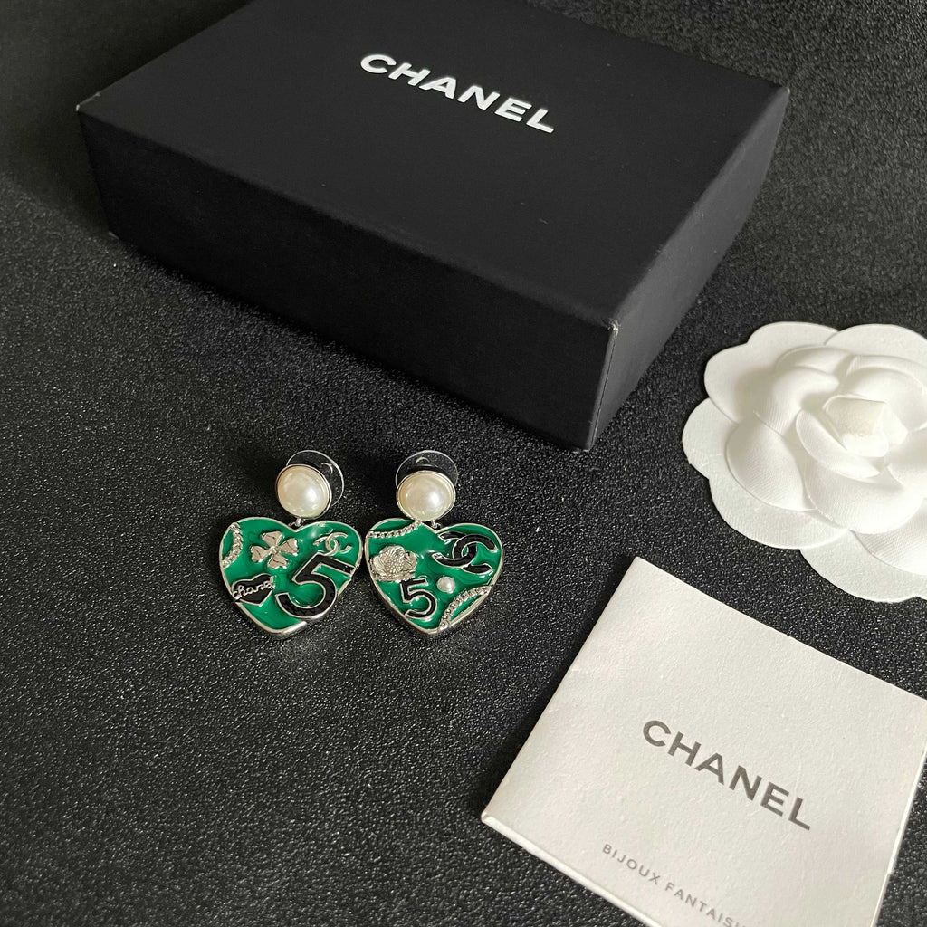 Chanel Interlocking C Pearl Asymmetric Earrings - album image 5