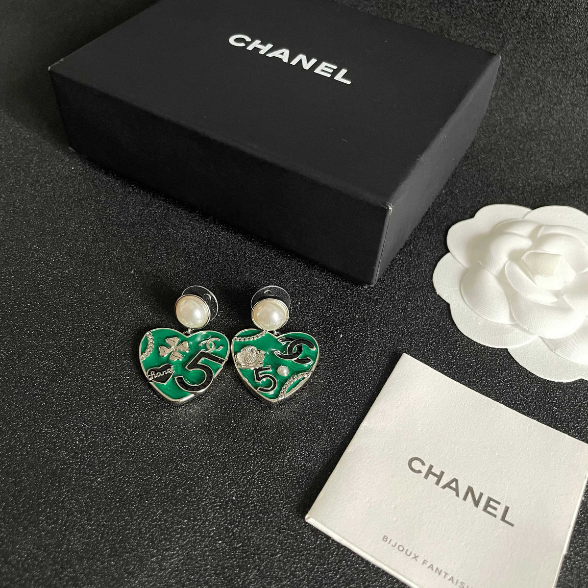 Chanel Interlocking C Pearl Asymmetric Earrings - album image 5