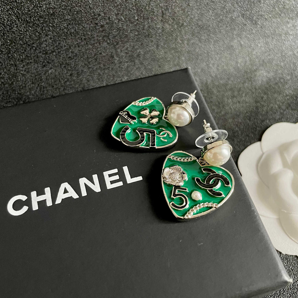 Chanel Interlocking C Pearl Asymmetric Earrings - album image 9