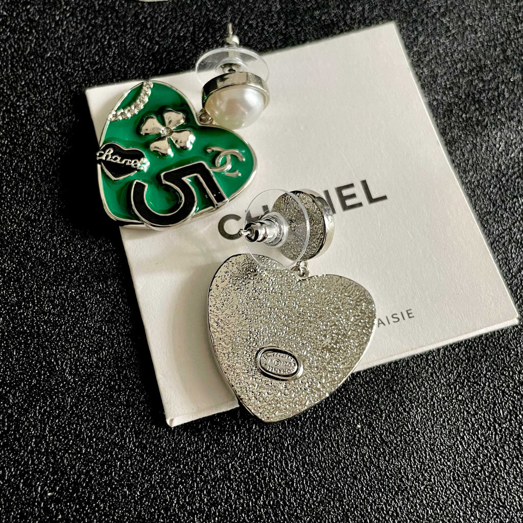 Chanel Interlocking C Pearl Asymmetric Earrings - album image 7