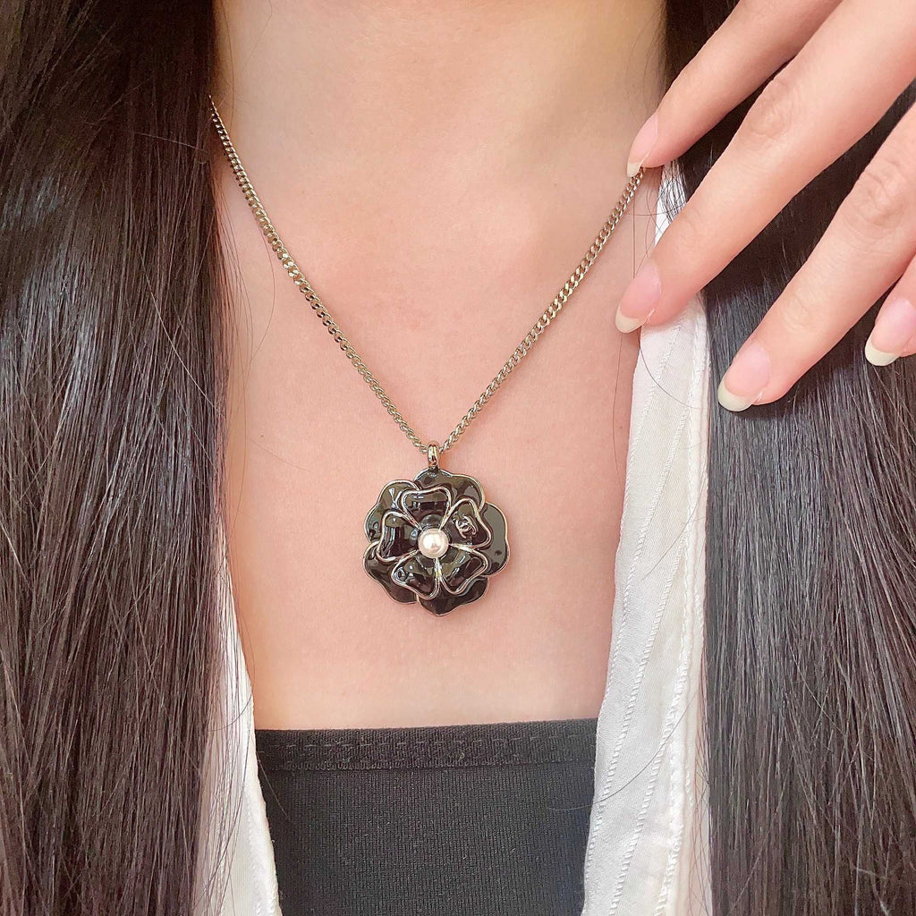 Chanel Interlocking C Camellia Necklace - album image 1