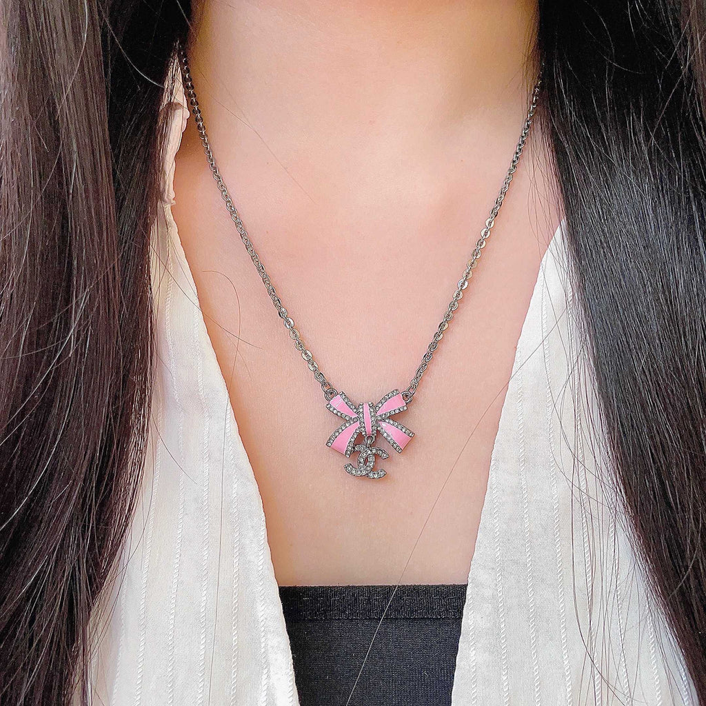 Chanel Interlocking C Bow Butterfly Crystal Accent Necklace - album image 3