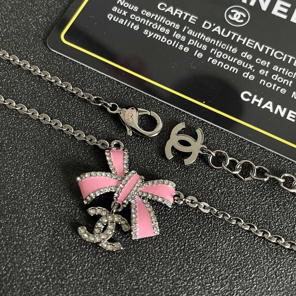 Chanel Interlocking C Bow Butterfly Crystal Accent Necklace - album image 7