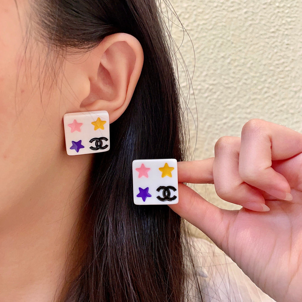 Chanel Interlocking C Star Stud Earrings - album image 1