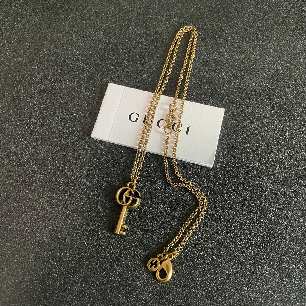 Gucci Interlocking G Key Necklace - album image 9