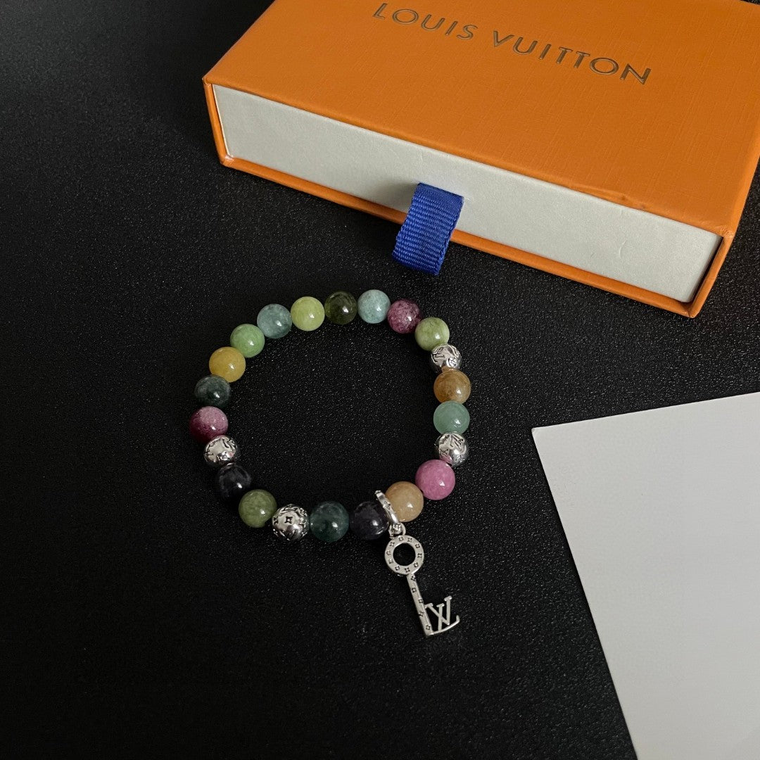 Louis Vuitton Mother-of-Pearl Pearl Monogram LV Letter Bracelet - album image 5
