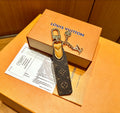 Louis Vuitton Key Silver-Tone Monogram V Letter Letter Keychain - album image 1