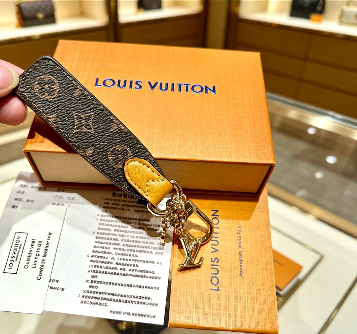 Louis Vuitton Key Silver-Tone Monogram V Letter Letter Keychain - album image 5