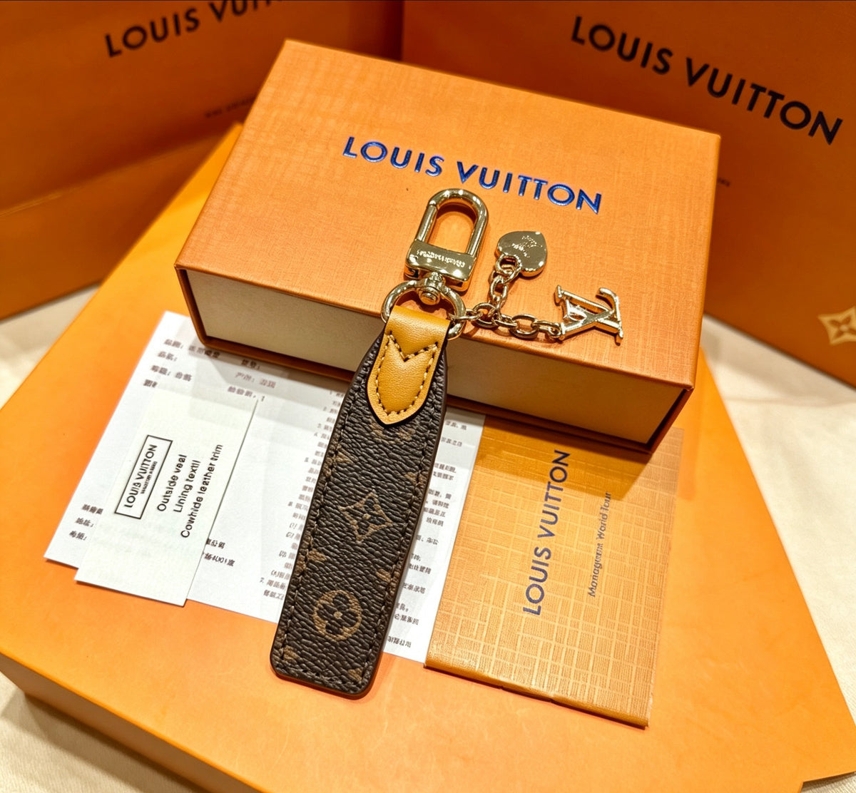 Louis Vuitton Key Silver-Tone Monogram V Letter Letter Keychain - album image 6