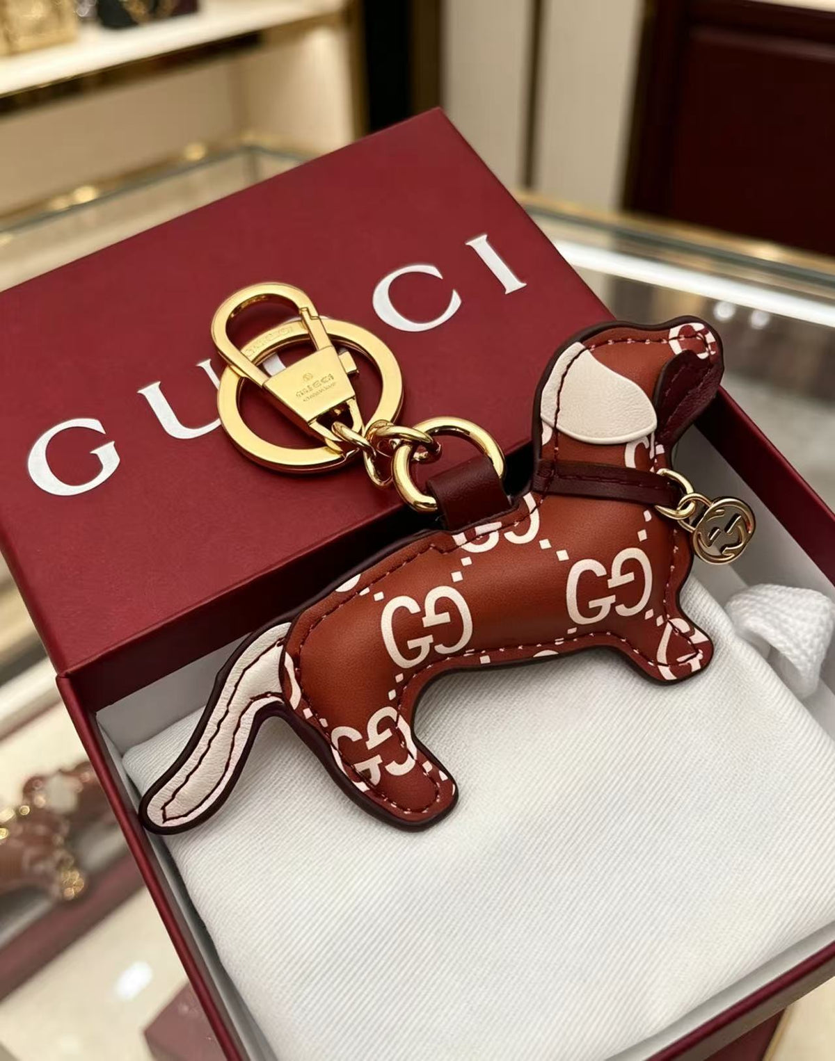 Gucci Interlocking G Key Monogram Leather Keychain - album image 1
