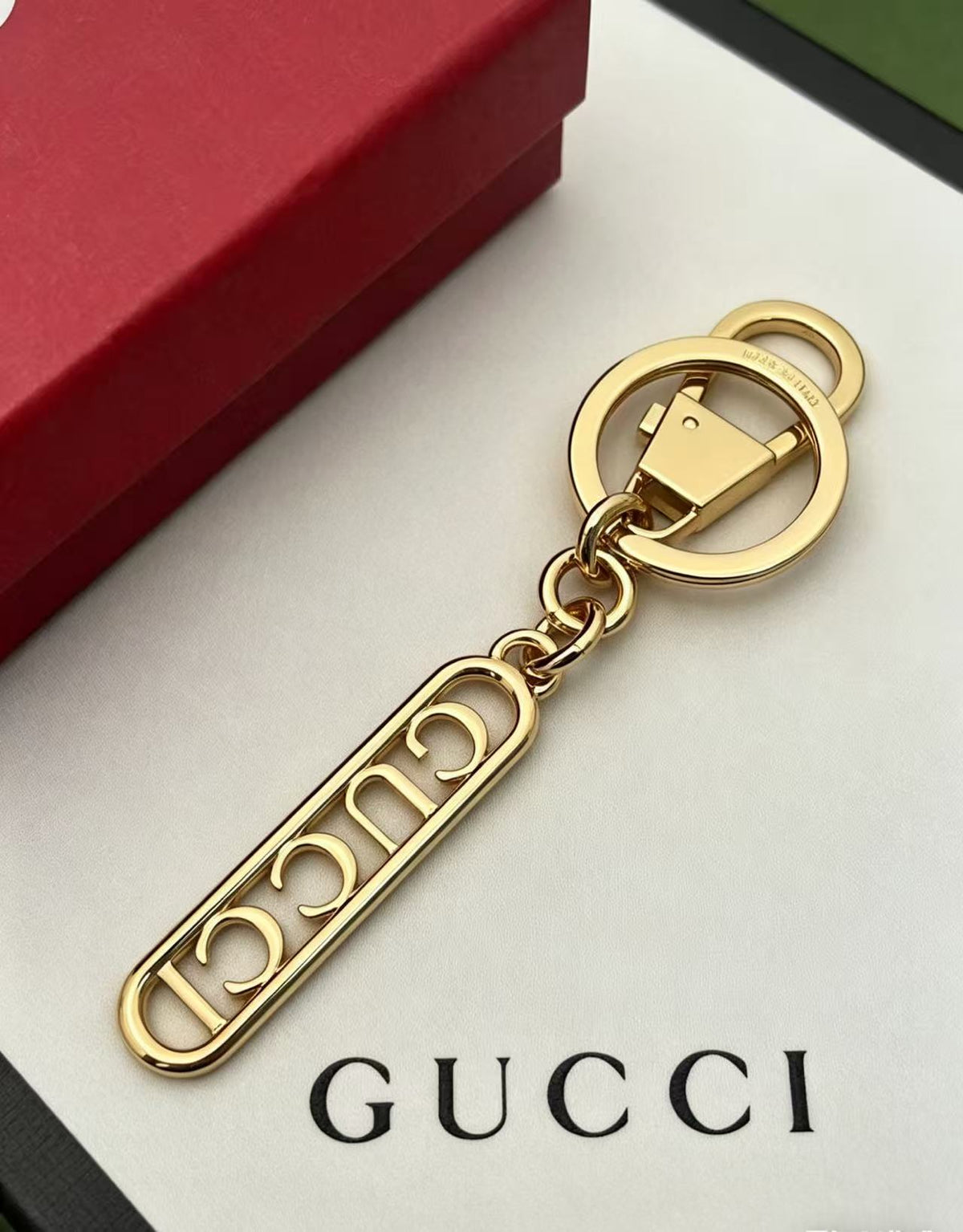 Gucci Key GG Letter Openwork Keychain - album image 2