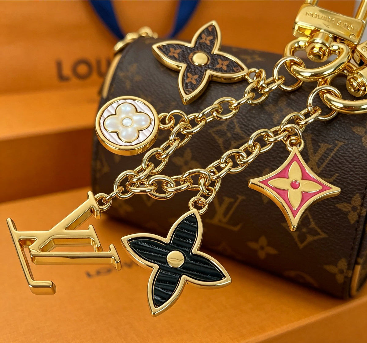 Louis Vuitton Spring Street Key Flower Monogram Letter Keychain - album image 5