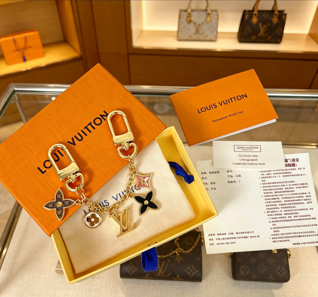 Louis Vuitton Spring Street Key Flower Monogram Letter Keychain - album image 1