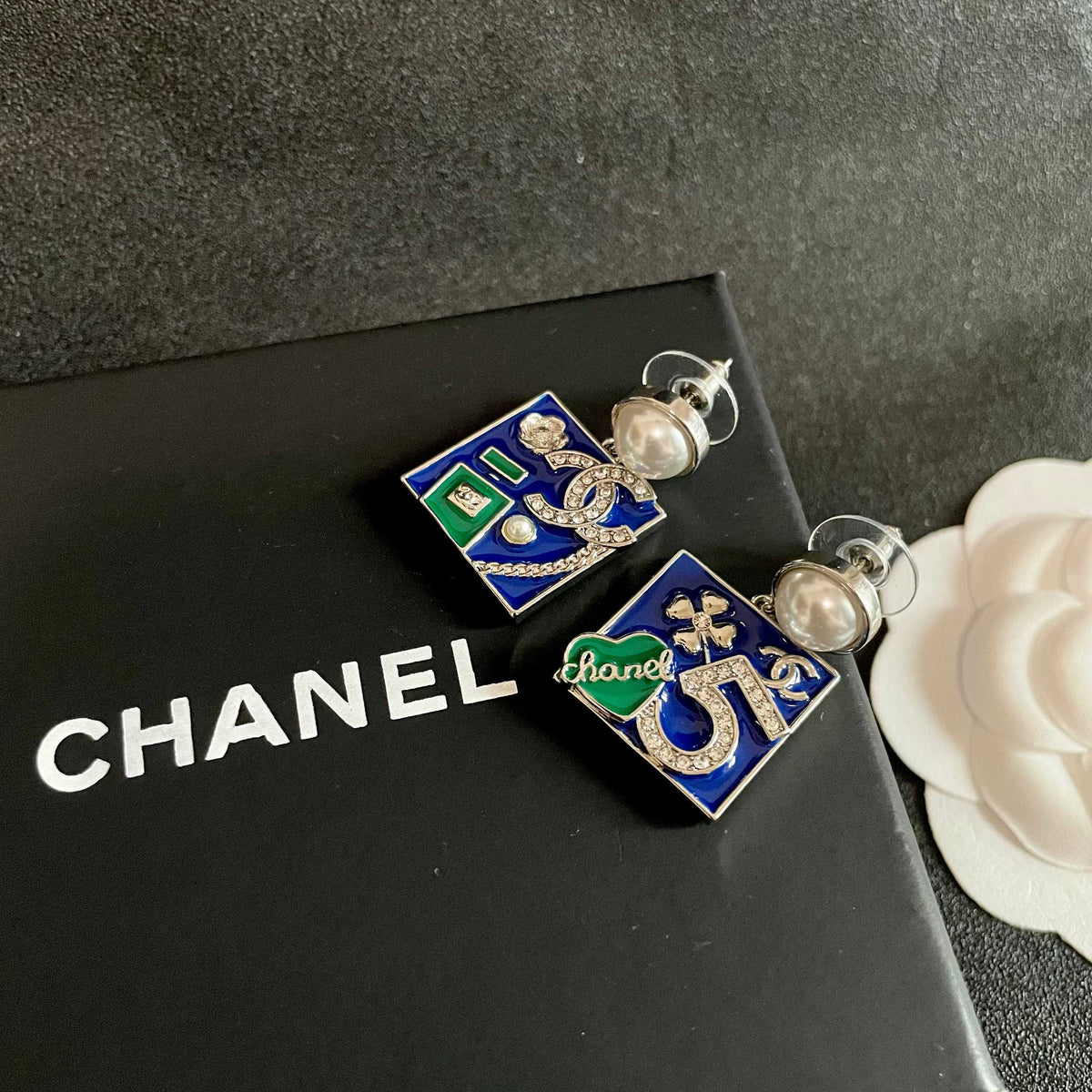 Chanel Interlocking C Asymmetric Earrings - album image 9