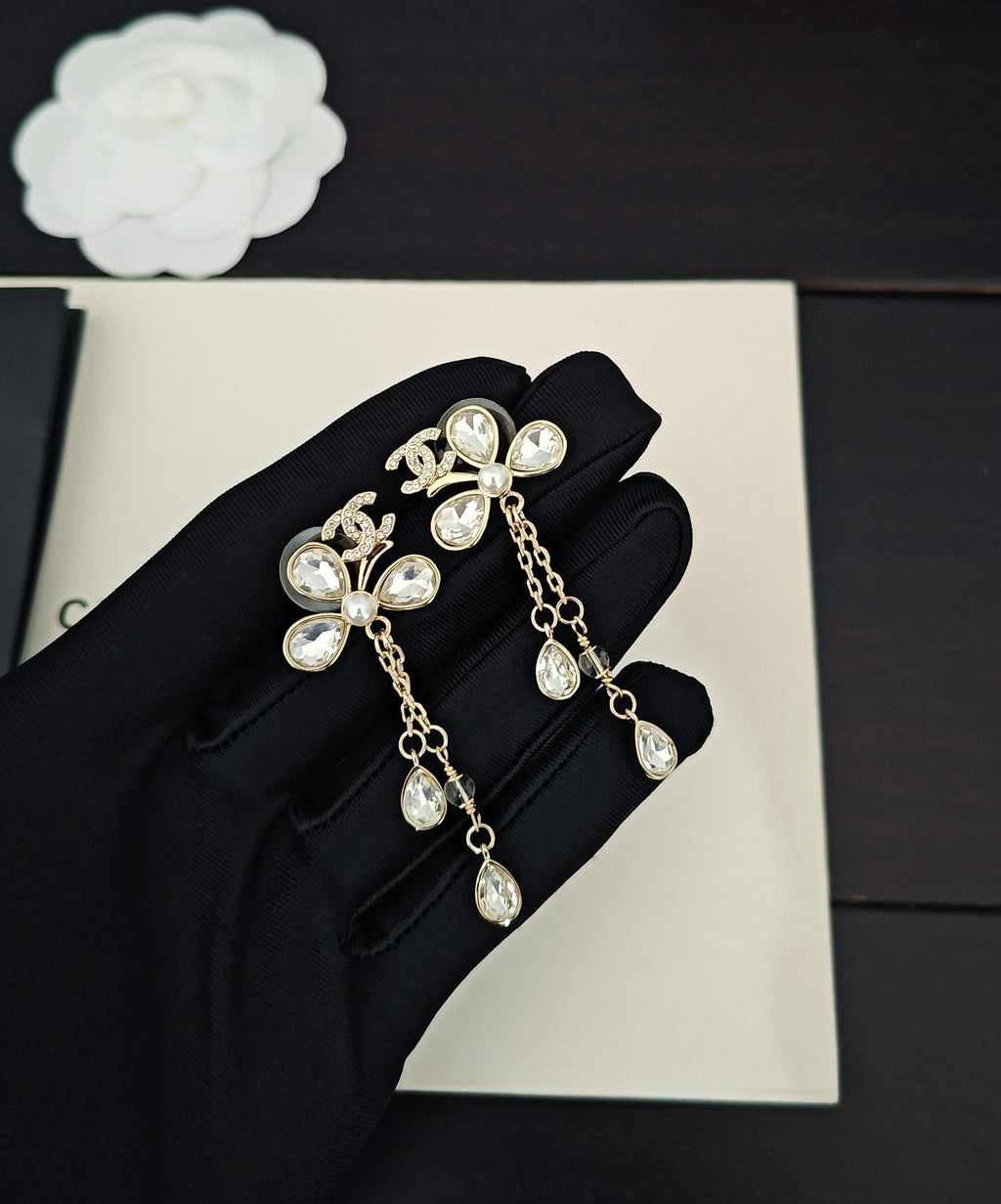 Chanel Tassel Crystal Accent Earrings - album image 1