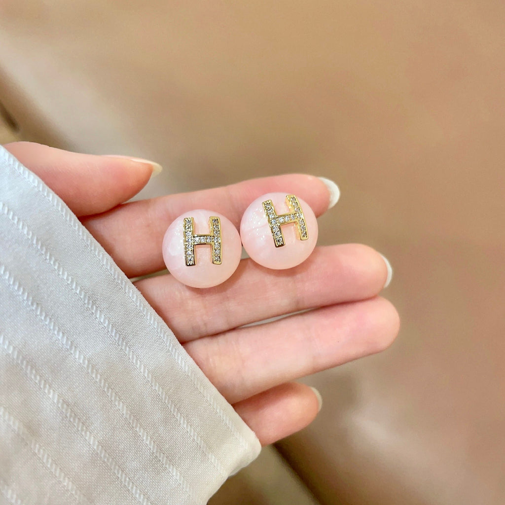 Hermès White Round Stud Earrings - album image 4