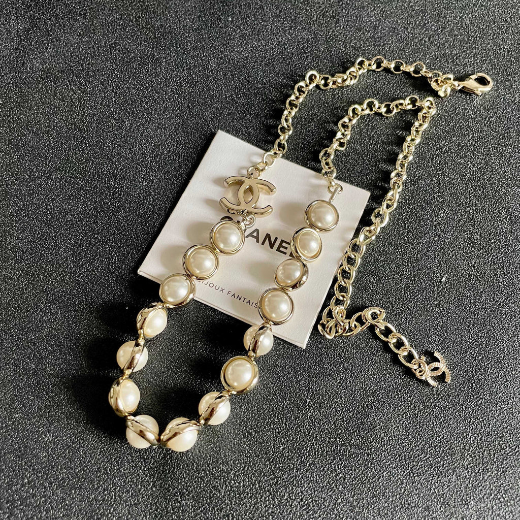 Chanel Interlocking C Pearl Necklace - album image 9
