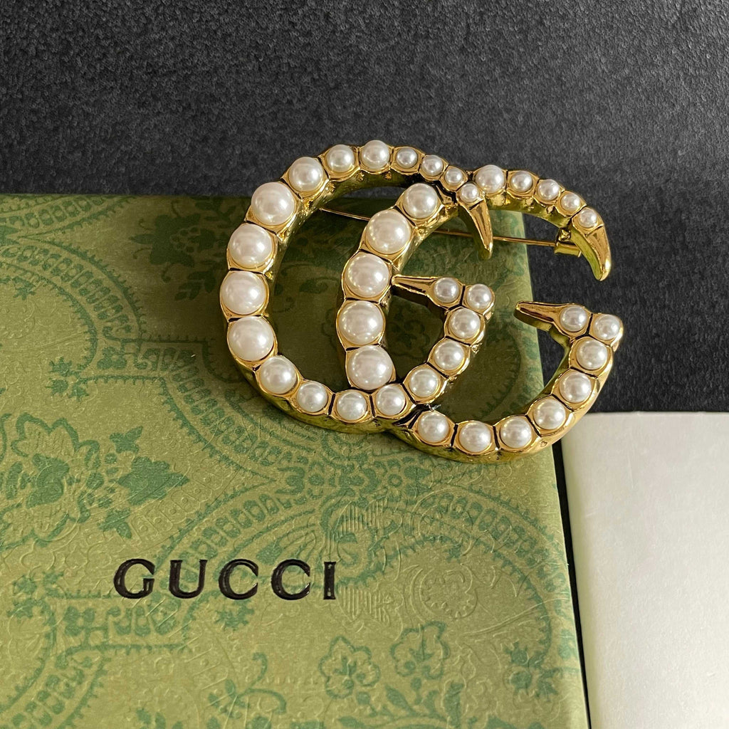 Gucci Gold-Tone Crystal Interlocking G Brooch - album image 9
