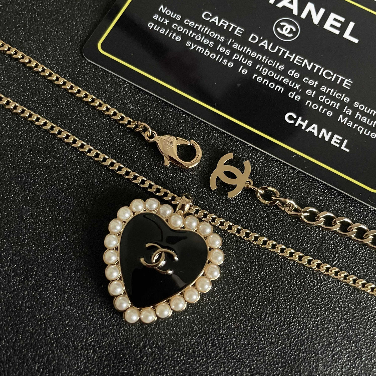 Chanel Interlocking C Pearl Heart Necklace - album image 7