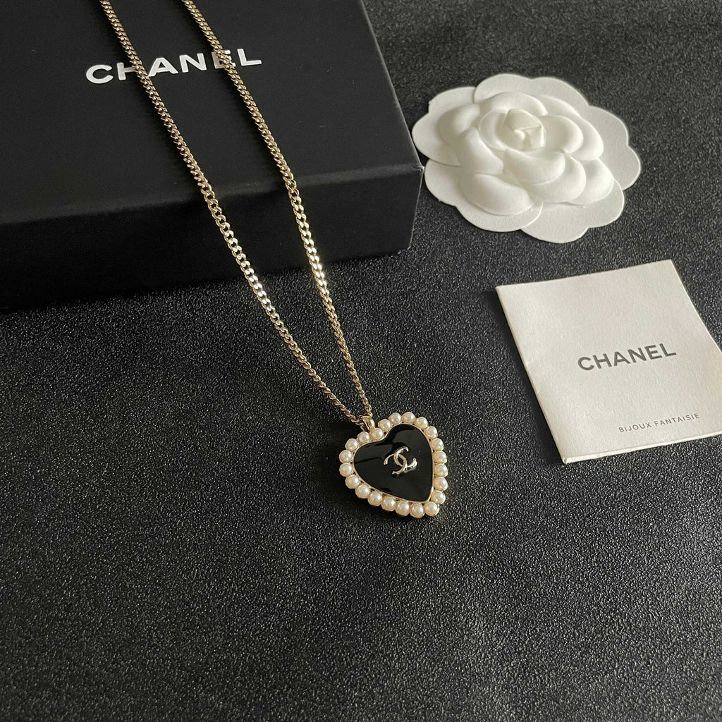 Chanel Interlocking C Pearl Heart Necklace - album image 6