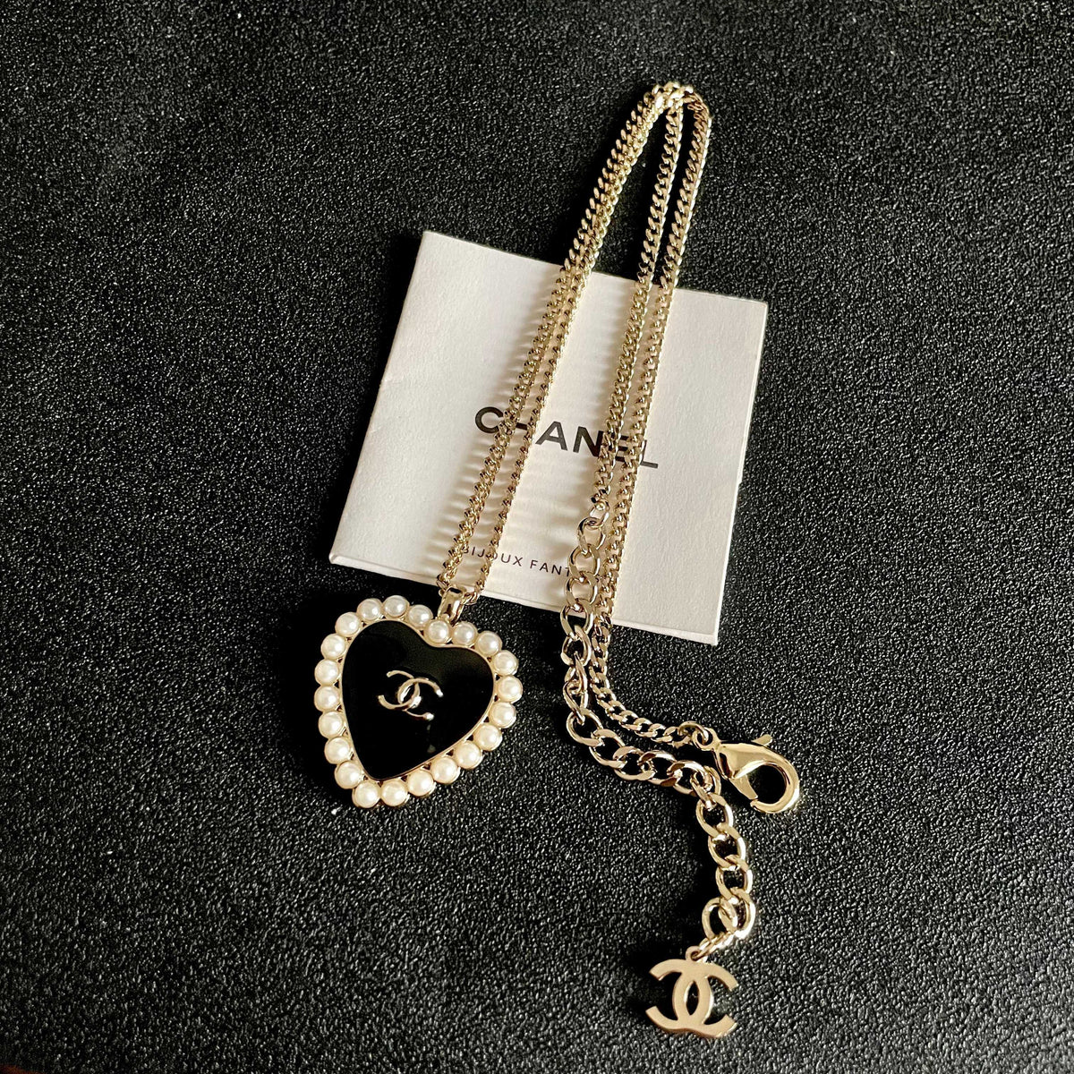 Chanel Interlocking C Pearl Heart Necklace - album image 9