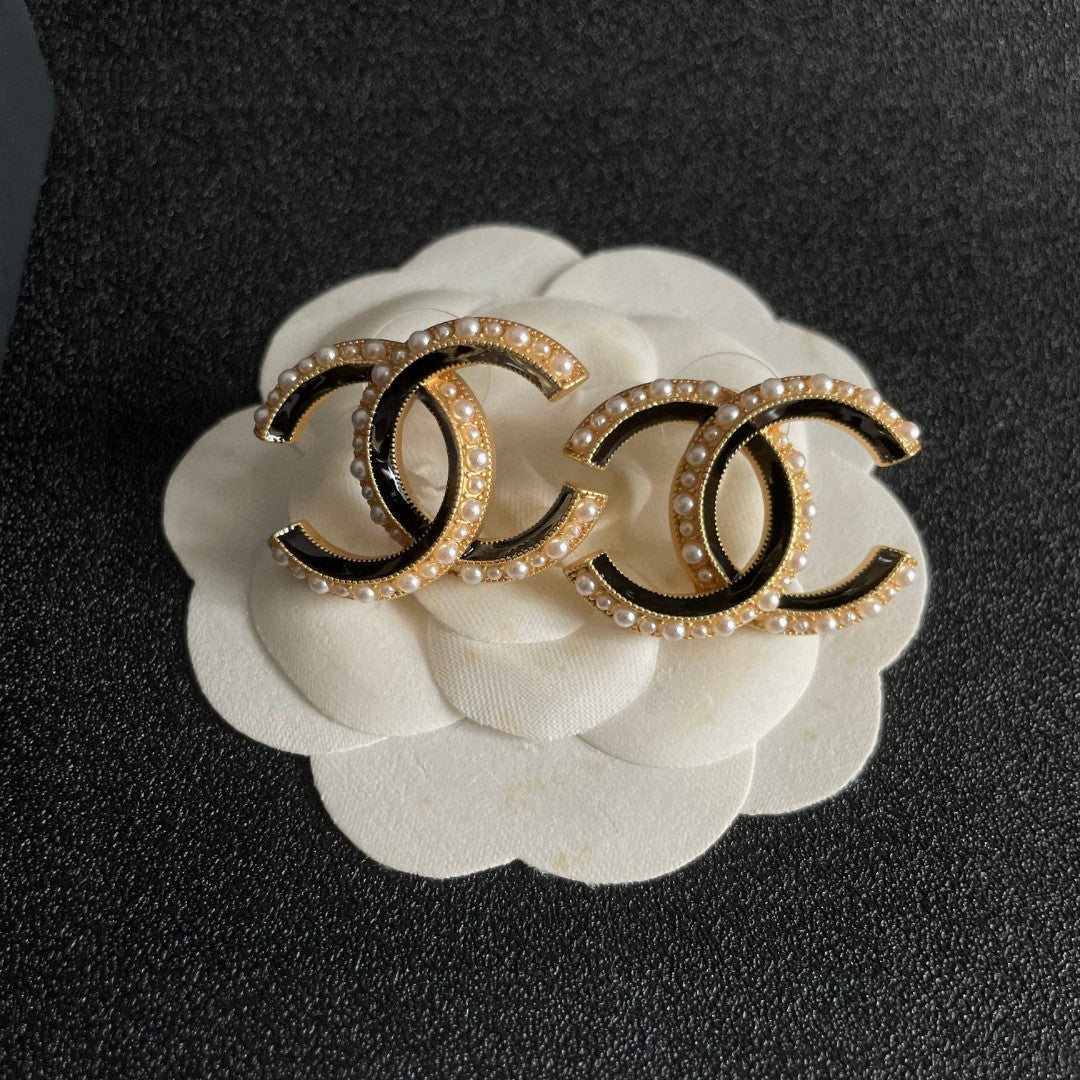 Chanel Interlocking C Pearl Stud Earrings - album image 8