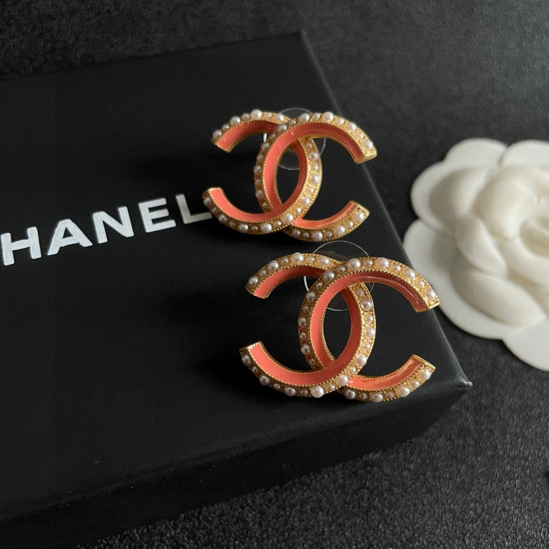 Chanel Interlocking C Pearl Stud Earrings - album image 9