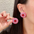 Chanel Interlocking C Circular Stud Earrings - album image 1