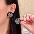 Chanel Interlocking C Crystal Accent Stud Earrings - album image 1