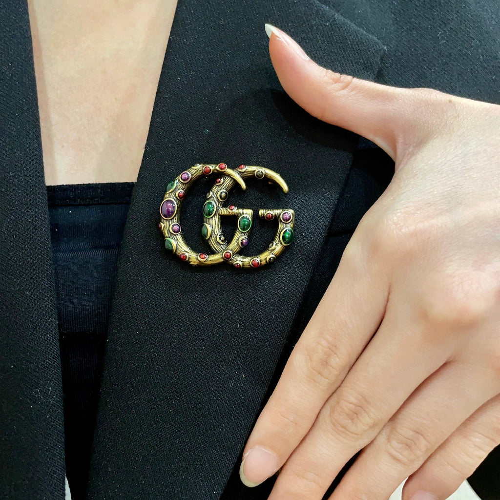 Gucci Gold-Tone Interlocking G Brooch - album image 1