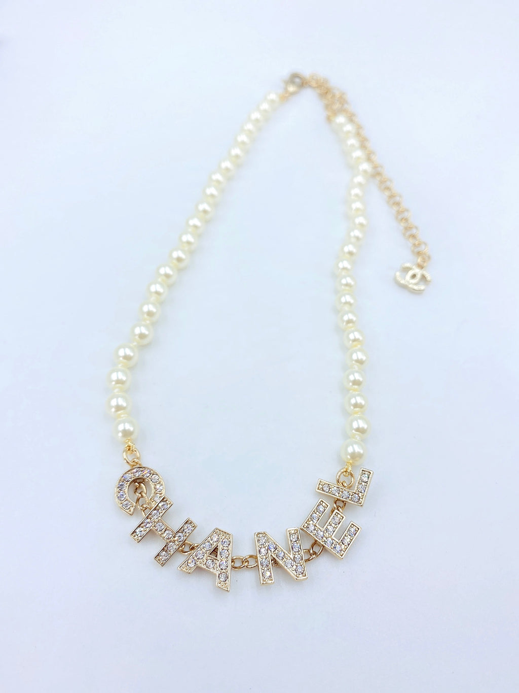 Chanel Pearl Letter Necklace - album image 1
